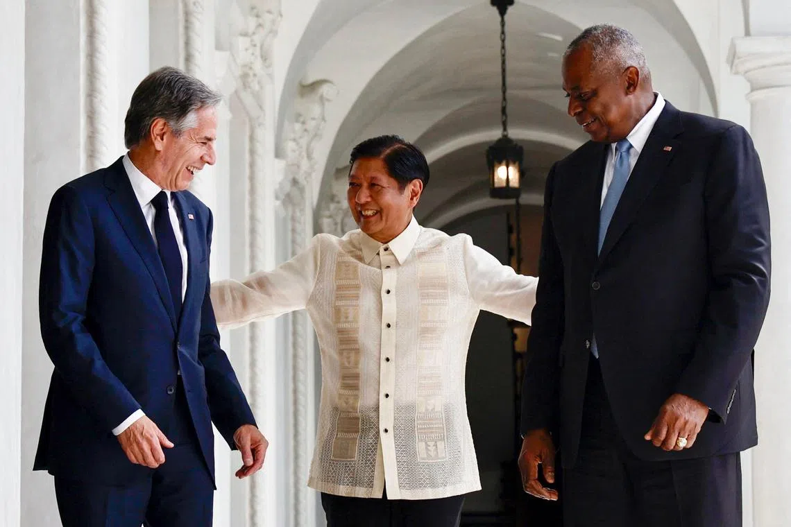 TOPSHOT - Philippines' President Ferdinand Marcos Jr. (C) talks to US Secretary of State Antony Blinken (L) and US Secretary of Defense Lloyd Austin during a courtesy visit at the Malacanang Palace in Manila on July 30, 2024.  (Photo by Francis R. MALASIG / POOL / AFP)