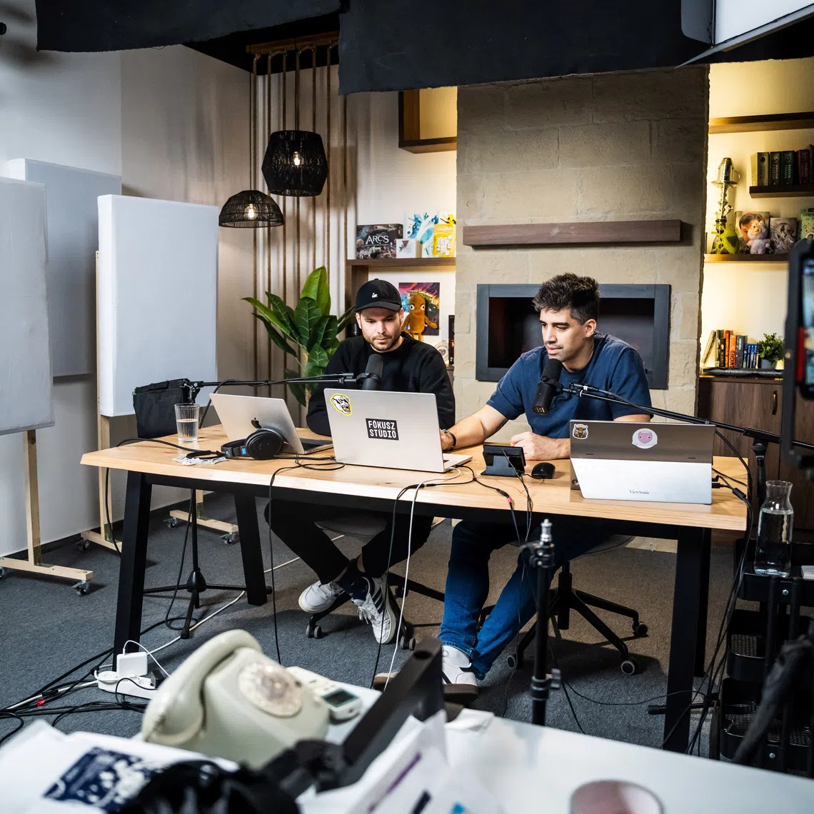 Adam Nagy and his co-host, Barnabas Bucsek, talk during their usual morning live broadcast of Jolvanezigy (\"It’s okay this way\") in Budapest, Hungary, November 7, 2025. REUTERS/Marton Monus