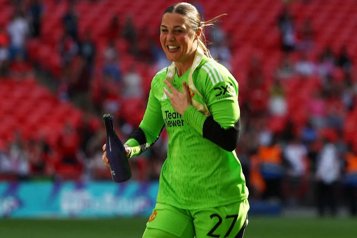 FILE PHOTO: Soccer Football - Women's FA Cup - Final - Manchester United v Tottenham Hotspur - Wembley Stadium, London, Britain - May 12, 2024 Manchester United's Mary Earps celebrates after winning the women's FA Cup REUTERS/Molly Darlington/File Photo/File Photo