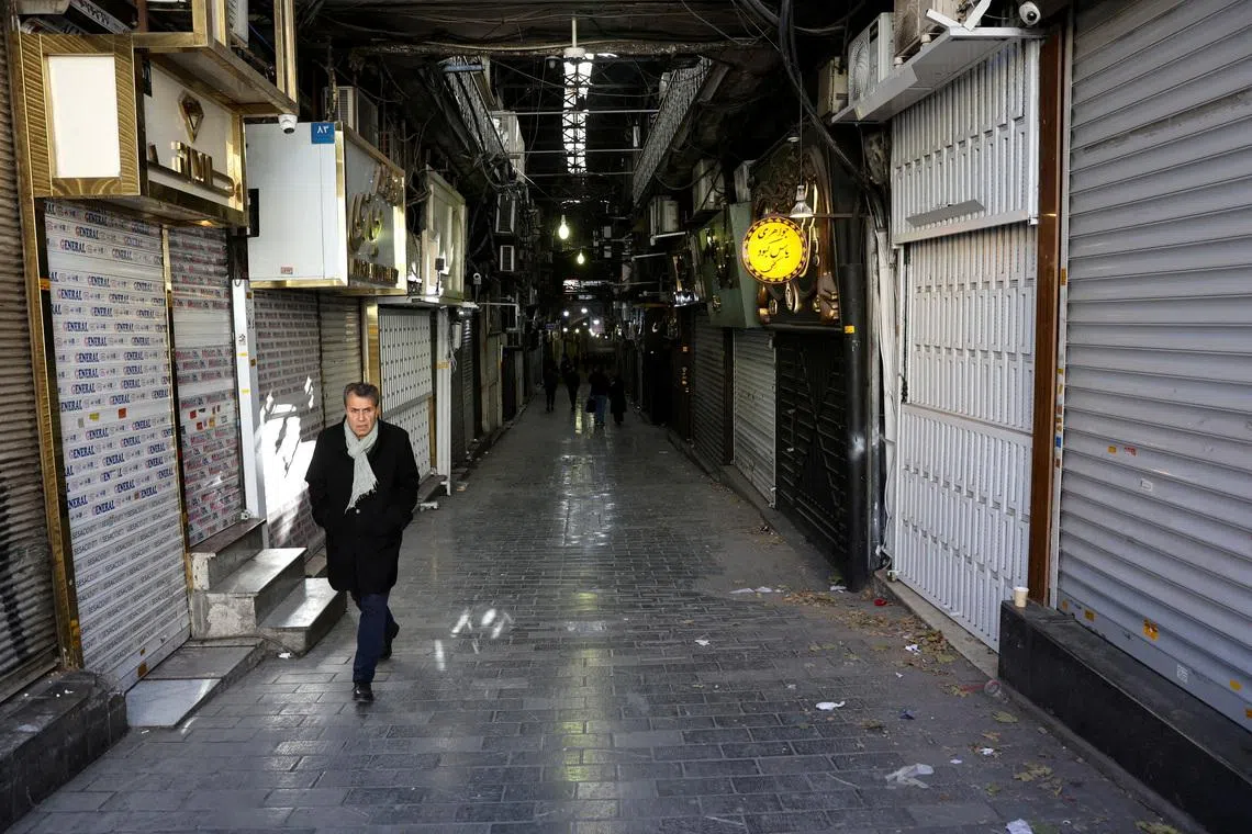 Iran’s traders, frustrated by economic losses, are turning against its clerics