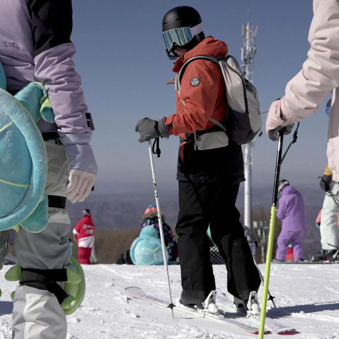 A visitor prepares to ski at Wanlong ski resort in Chongli district, Hebei province, China.
