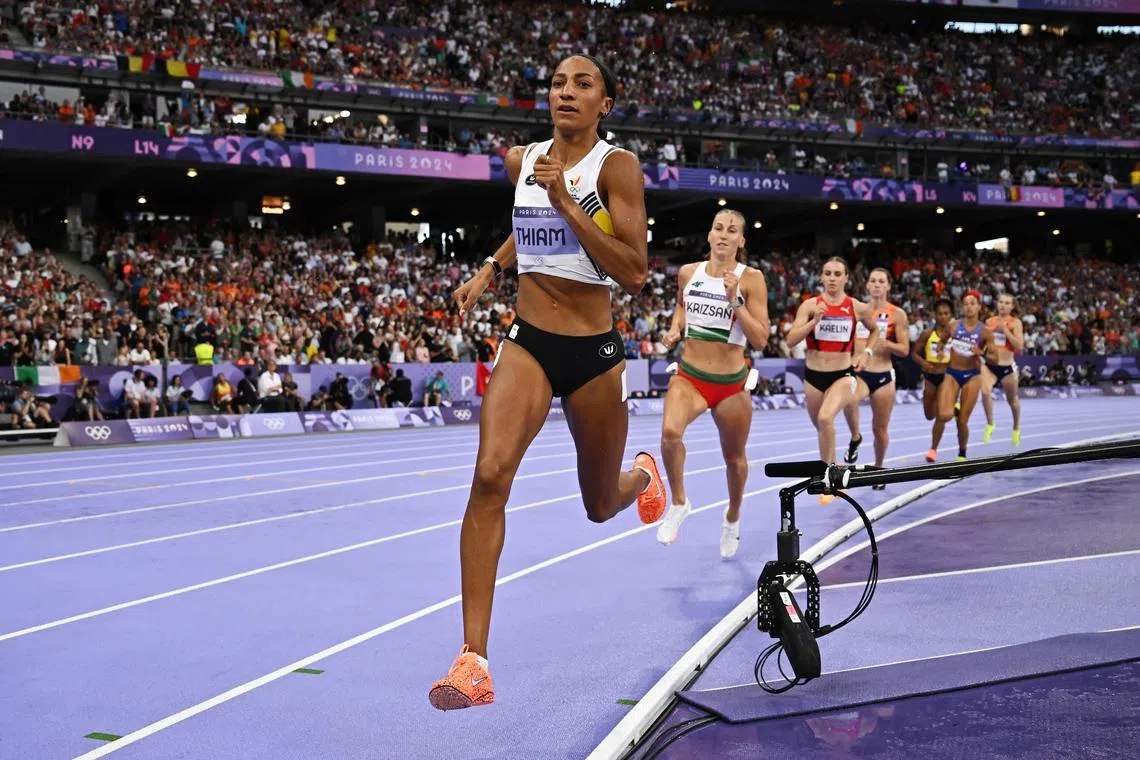 Paris 2024 Olympics - Athletics - Women's Heptathlon 800m - Stade de France, Saint-Denis, France - August 09, 2024.  Nafissatou Thiam of Belgium in action during heat 2. REUTERS/Dylan Martinez