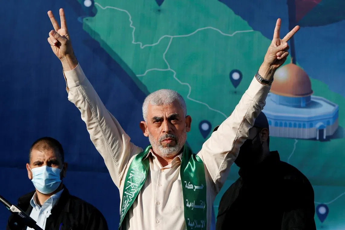FILE PHOTO: Hamas Gaza Chief Yehya Al-Sinwar gestures during an anti-Israel rally in Gaza City, May 24, 2021. REUTERS/Mohammed Salem/File Photo