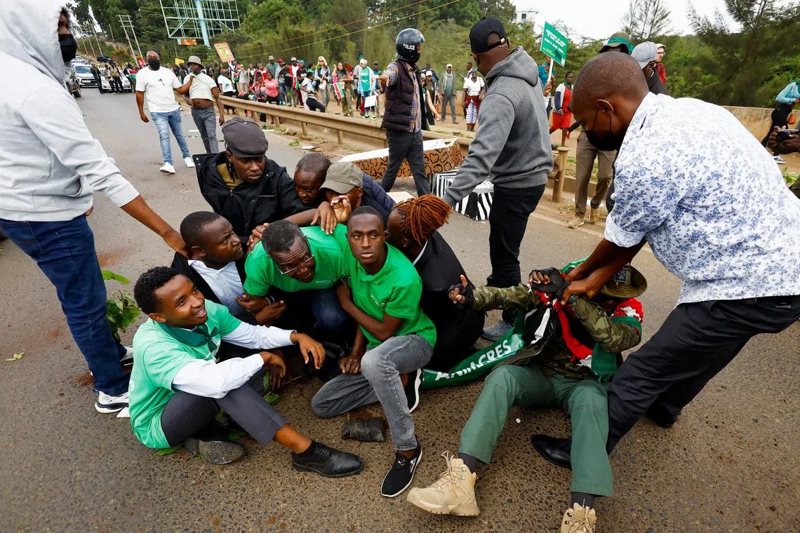 Kenya police fire tear gas, arrest ex chief justic