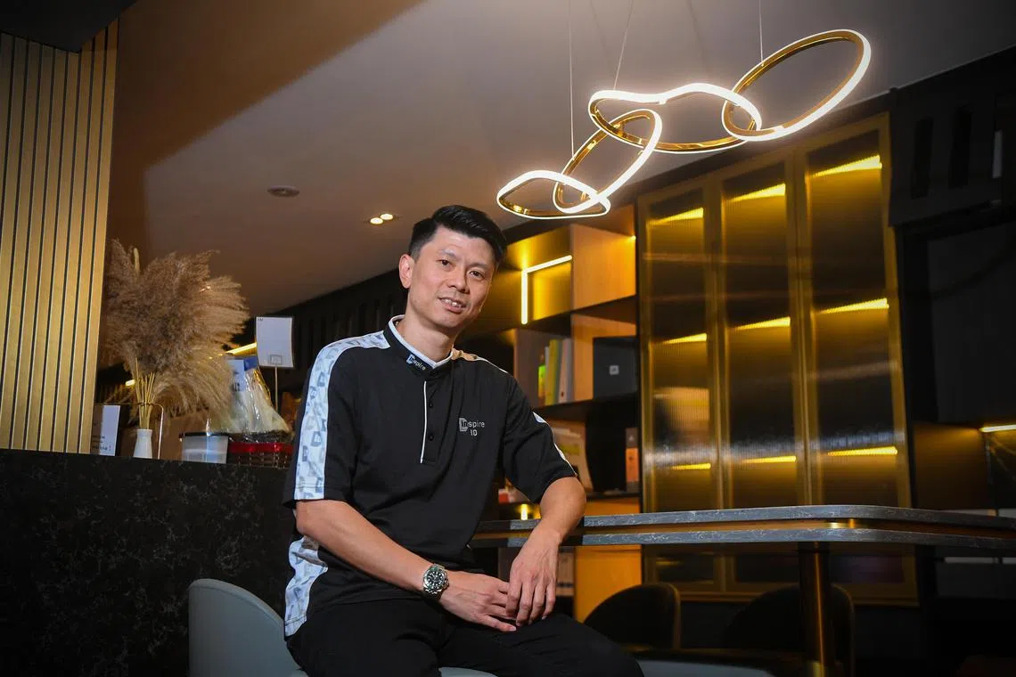 In his first job, Mr Russell Chin sometimes had "zero salary" as his job was wholly commission-based. He is now founder and managing director of Inspire ID Group, an interior design company. ST PHOTO: AZMI ATHNI