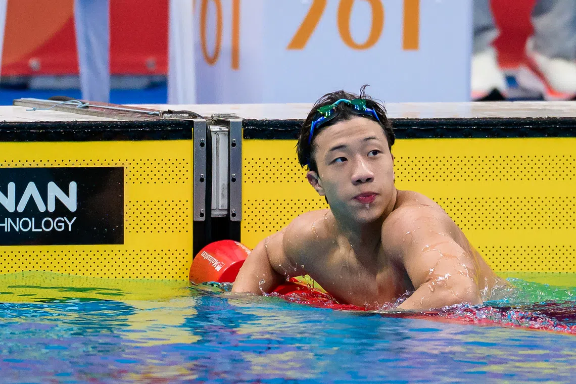 Singapore’s Tedd Chan sets a 50m backstroke national record in the heats at the Asian Games.