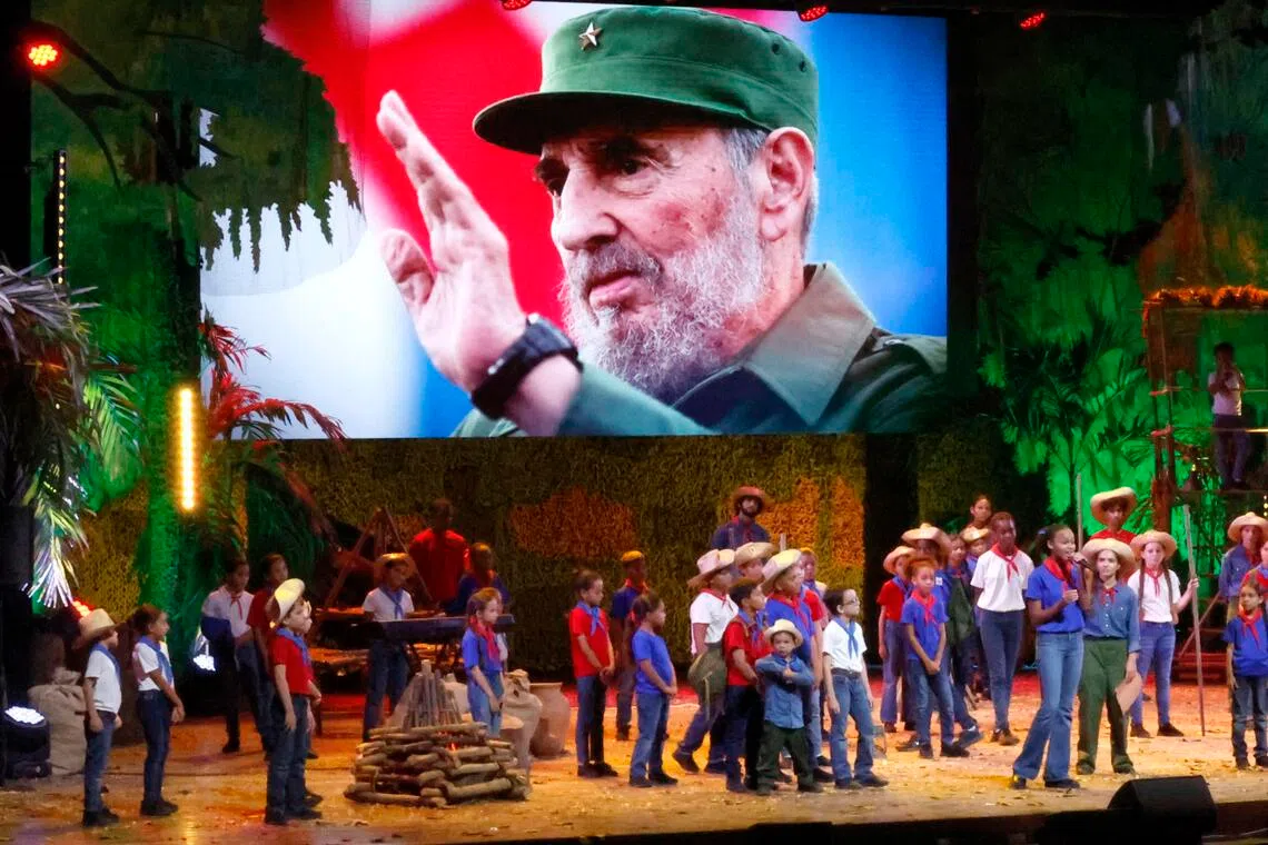 Members of Cuban children’s theatre company La Colmenita perform during the commemoration of the 100th anniversary of the birth of Cuban revolution leader Fidel Castro at the Karl Marx Theater in Havana, Cuba.