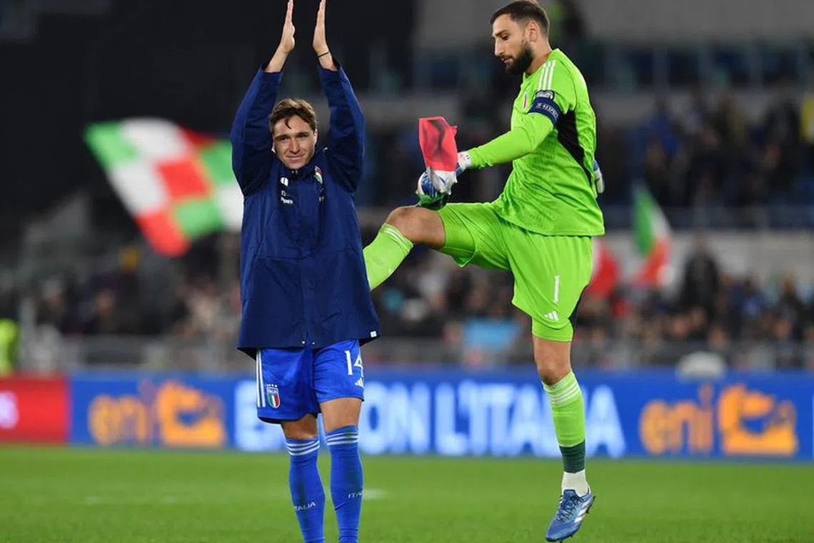 Soccer Football - UEFA Euro 2024 Qualifier - Group C - Italy v North Macedonia - Stadio Olimpico, Rome, Italy - November 17, 2023 Italy's Federico Chiesa and Gianluigi Donnarumma celebrate after the match REUTERS/Jennifer Lorenzini
