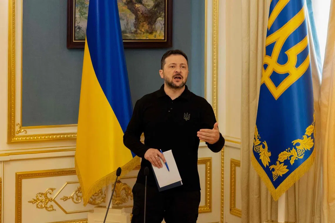 Ukrainian President Volodymyr Zelensky delivering a press conference in Kyiv on April 22.