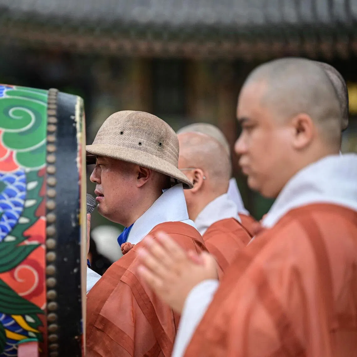 Buddhist monks offering prayers at Jogyesa Temple in Seoul on July 2.