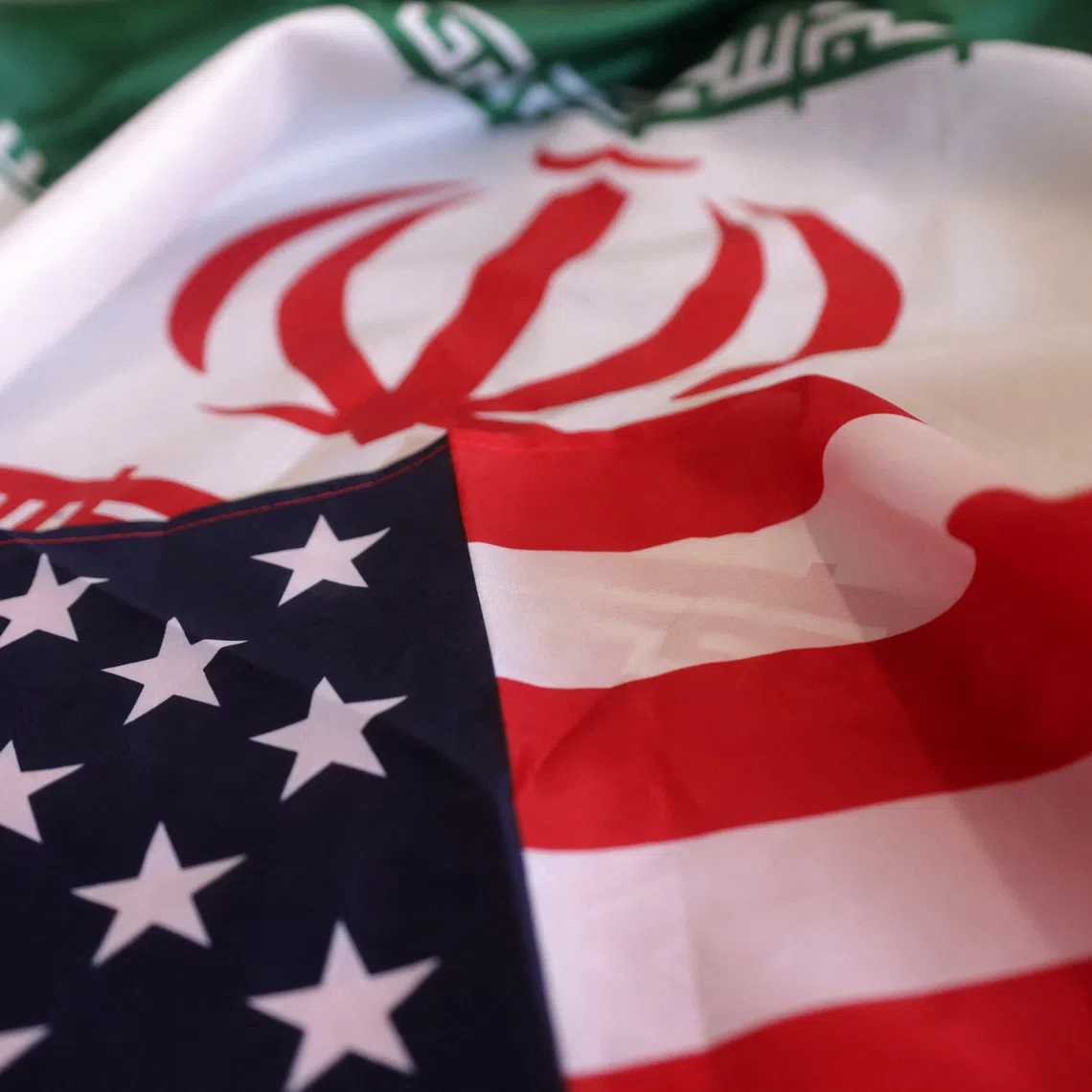 USA and Iranian flags are seen in this illustration taken, September 8, 2022. REUTERS/Dado Ruvic/Illustration