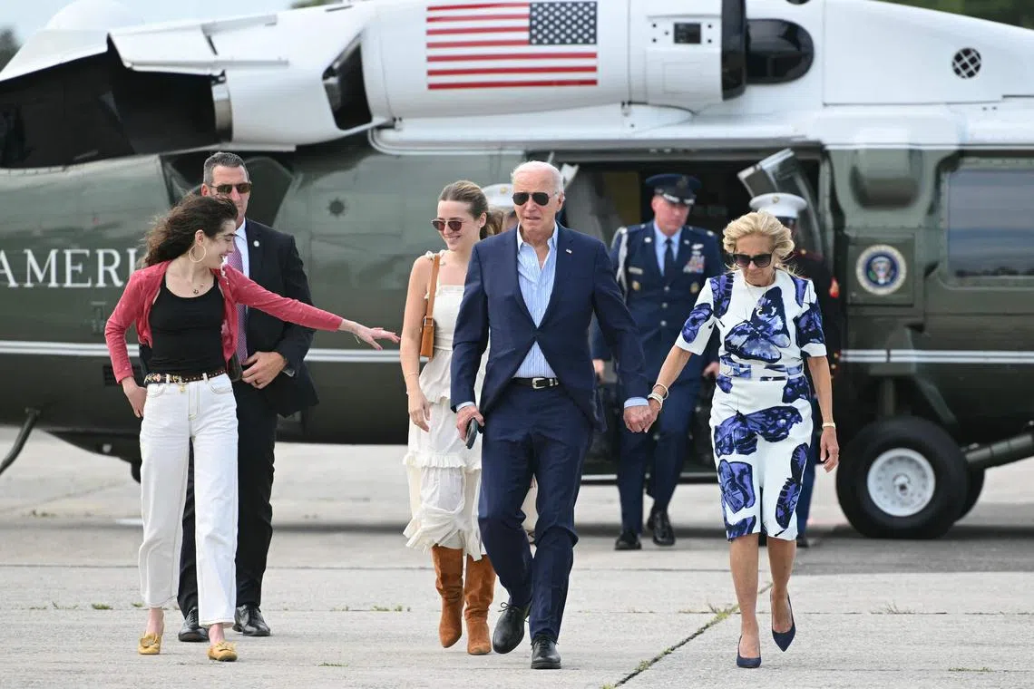 US President Joe Biden and First Lady Jill Biden walking from Marine One to board Air Force One, in Westhampton Beach, New York, on June 29.