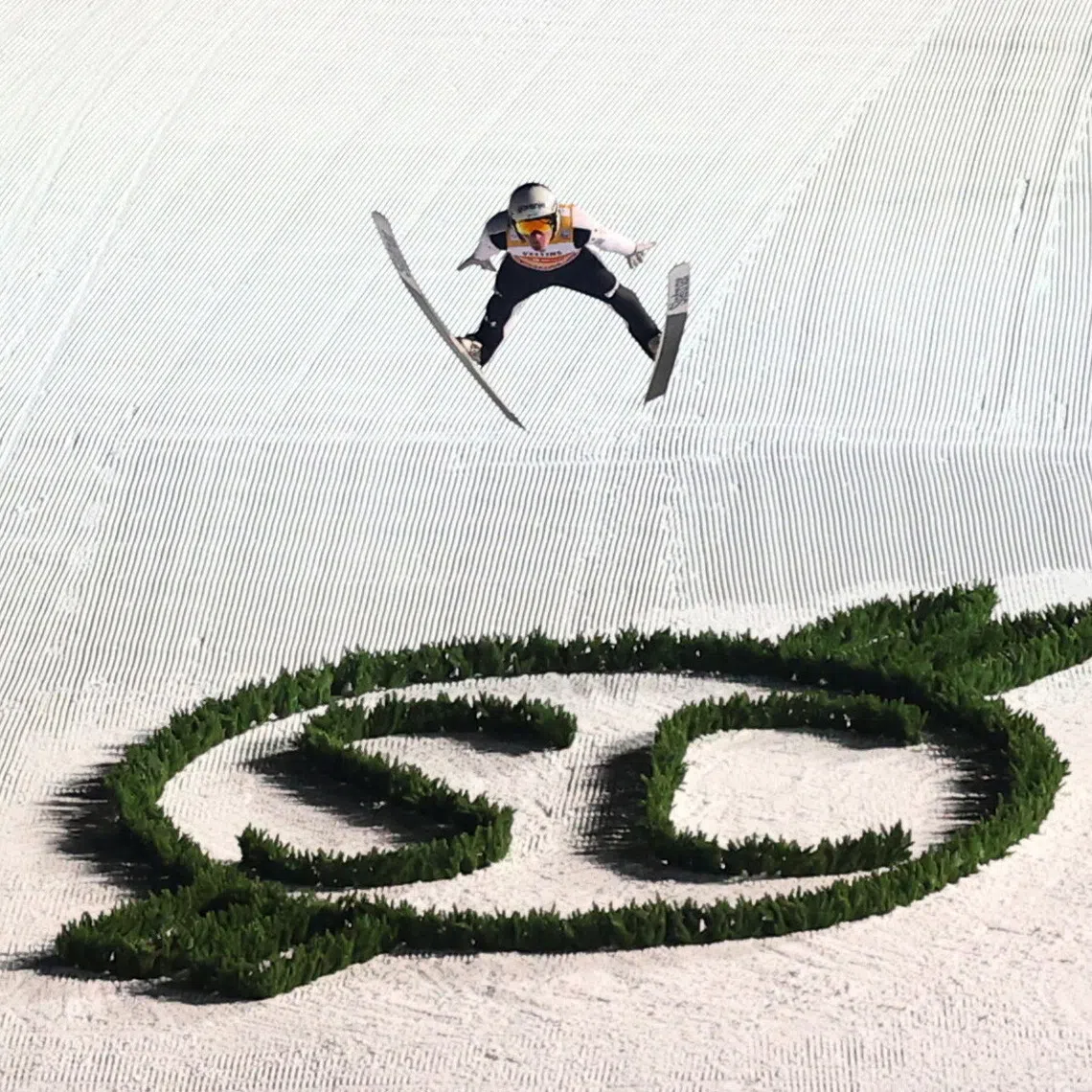 Ski Jumping - Four Hills Tournament - Oberstdorf, Germany - December 29, 2025 Slovenia's Domen Prevc in action during the final round REUTERS/Kai Pfaffenbach