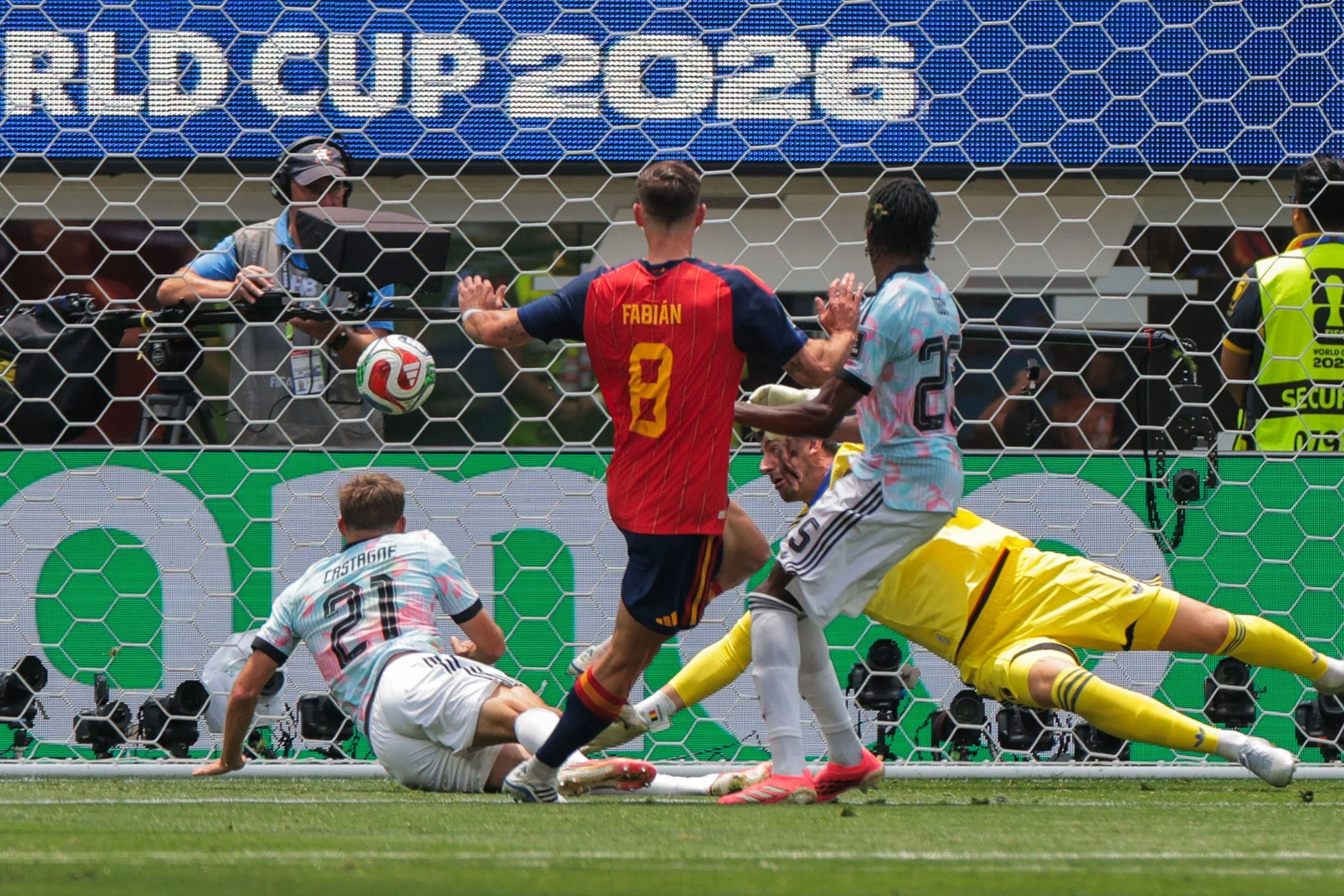 Spain's midfielder #08 Fabian Ruiz scores his team's first goal during the 2026 World Cup football tournament quarter-final match between Spain and Belgium at the Los Angeles Stadium in Inglewood on July 10, 2026.  (Photo by Etienne LAURENT / AFP)