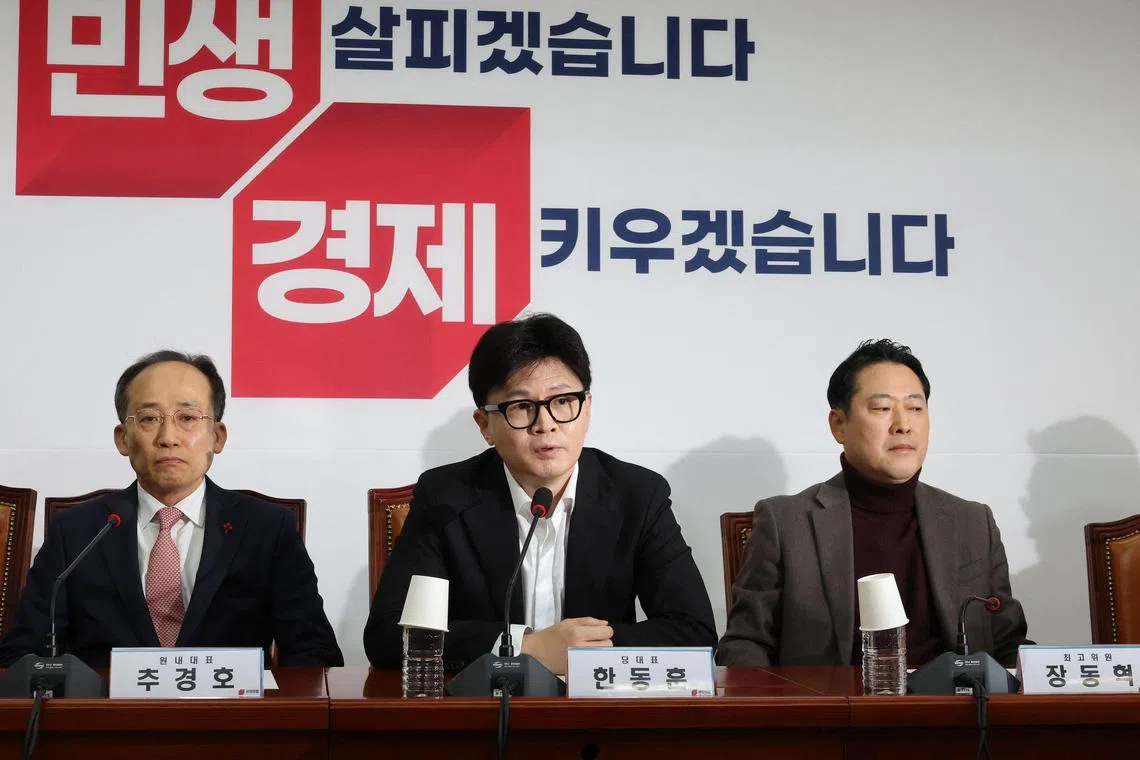People Power Party's chief Han Dong-hoon (centre) did not explicitly call for impeachment or respond to reporters when asked for clarification.