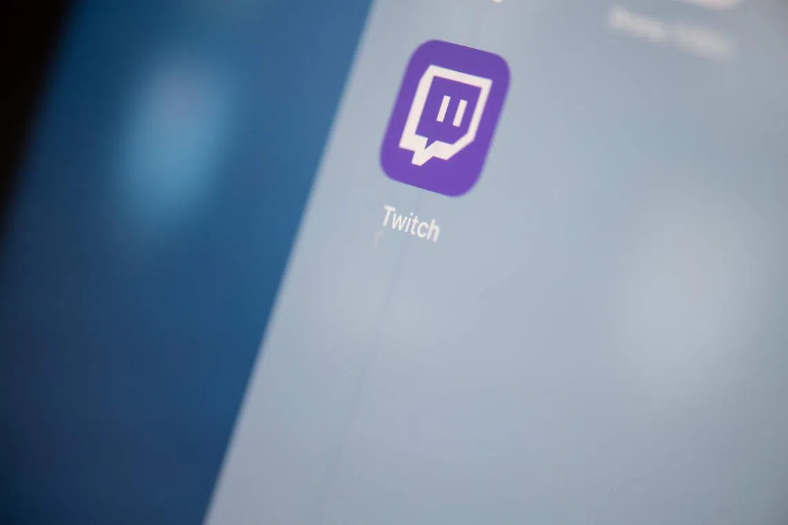 (FILES) This illustration picture taken on July 24, 2019 in Paris shows the US live streaming video platform Twitch logo application on the screen of a tablet. US-based live gaming streaming platform Twitch said on December 6, 2023 that it would stop its service in South Korea in February because of "seriously" high network costs. (Photo by Martin BUREAU / AFP)