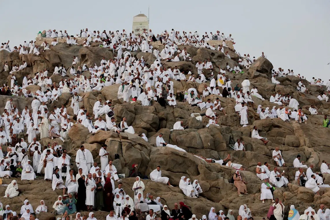 Muslim pilgrims gathering to pray at Jabal al-Rahmah, also known as Mount Arafat, during the annual hajj pilgrimage, outside the holy city of Mecca, Saudi Arabia, on June 5, 2025. 
