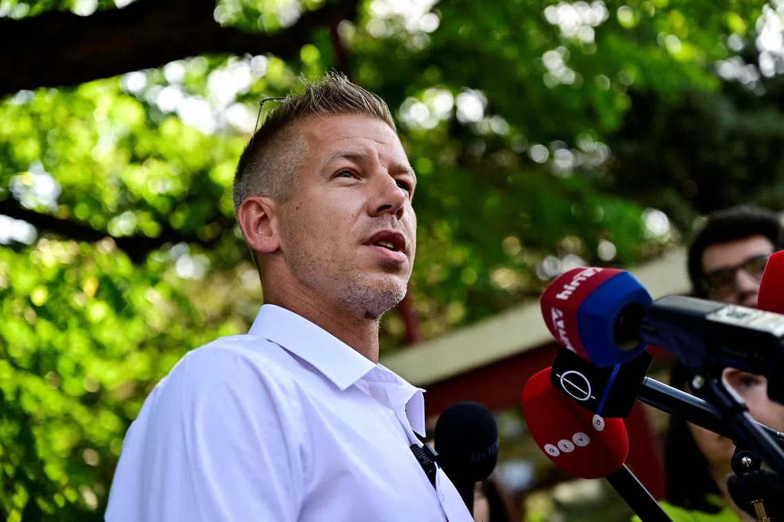 Peter Magyar, former government insider and leader of the Respect and Freedom (TISZA) Party, speaks to media after voting at a polling station during European Parliament and municipal elections, in Budapest, Hungary, June 9, 2024. REUTERS/Marton Monus/ File Photo