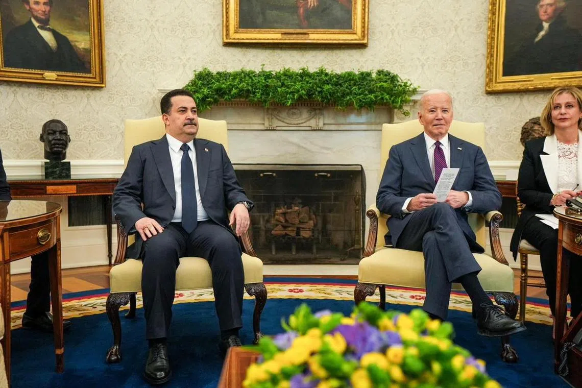 US President Joe Biden (right) meets Iraqi Prime Minister Mohamed Shia al-Sudani at the White House in Washington.
