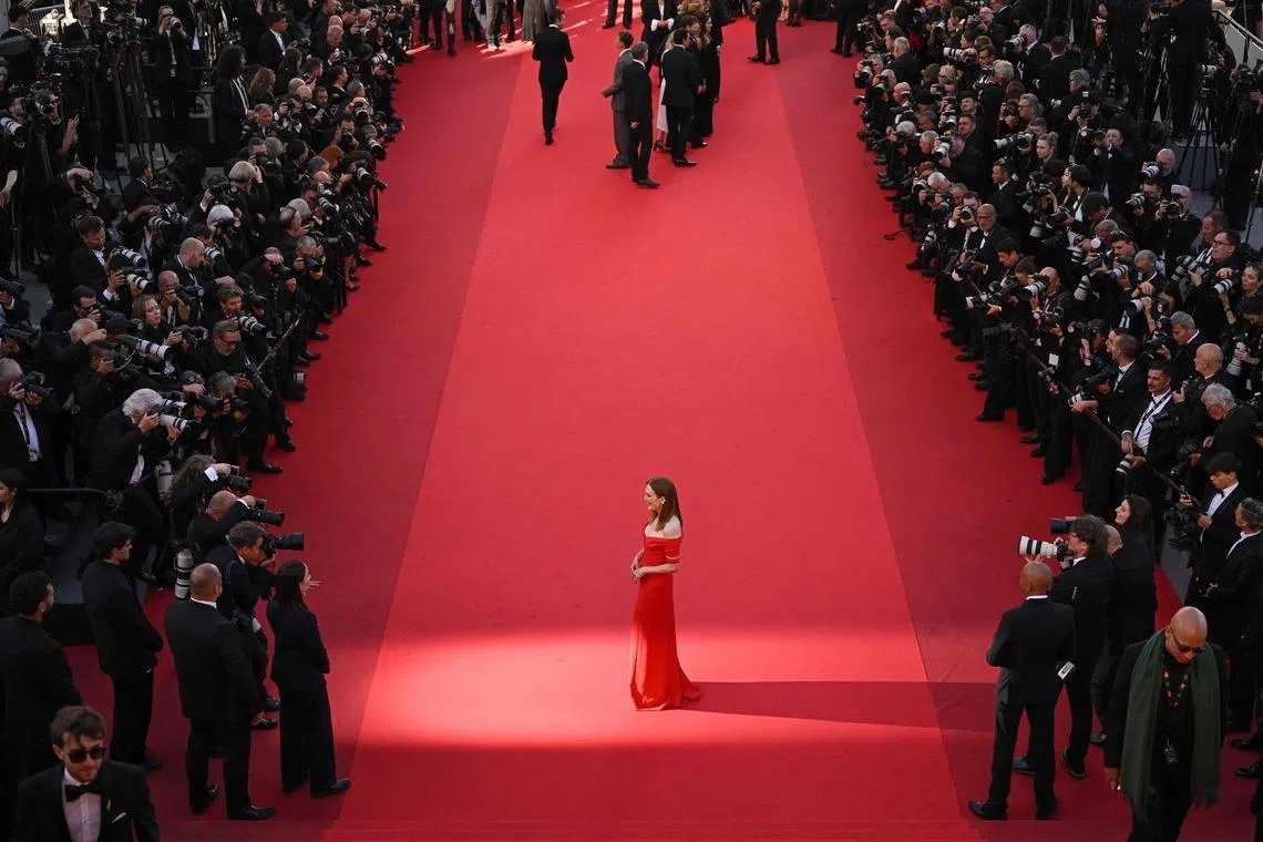 US actress Julianne Moore arriving for the screening of the film "Garance" (Another Day) at the 79th edition of the Cannes Film Festival in Cannes, southern France on May 17, 2026. 