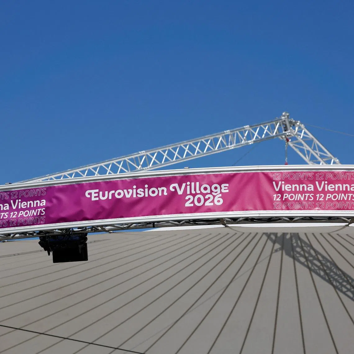 View of banners at the \"Eurovision Village\" next to the city hall in Vienna, Austria, May 8, 2026. REUTERS/Lisa Leutner