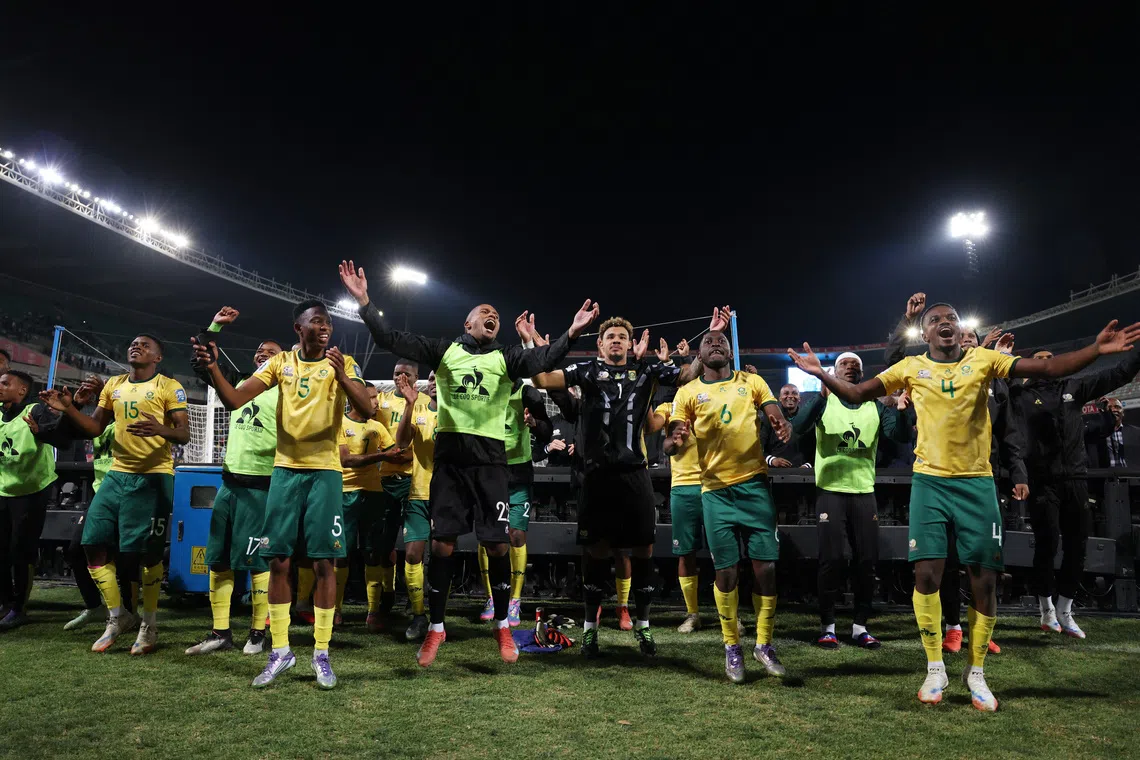 Soccer Football - World Cup - CAF Qualifiers - Group C - Lesotho v South Africa - Toyota Stadium, Bloemfontein, South Africa - September 5, 2025 South Africa's Teboho Mokoena celebrates with teammates after the match REUTERS/Siphiwe Sibeko