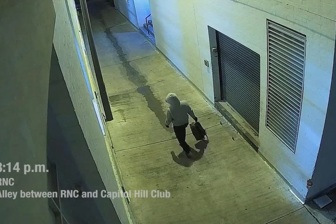 FILE PHOTO: A suspect in the planting of explosive devices near the Democratic and Republican committee headquarters in Washington is seen in this still frame taken from video released on March 9, 2021. FBI/Handout via REUTERS/File Photo