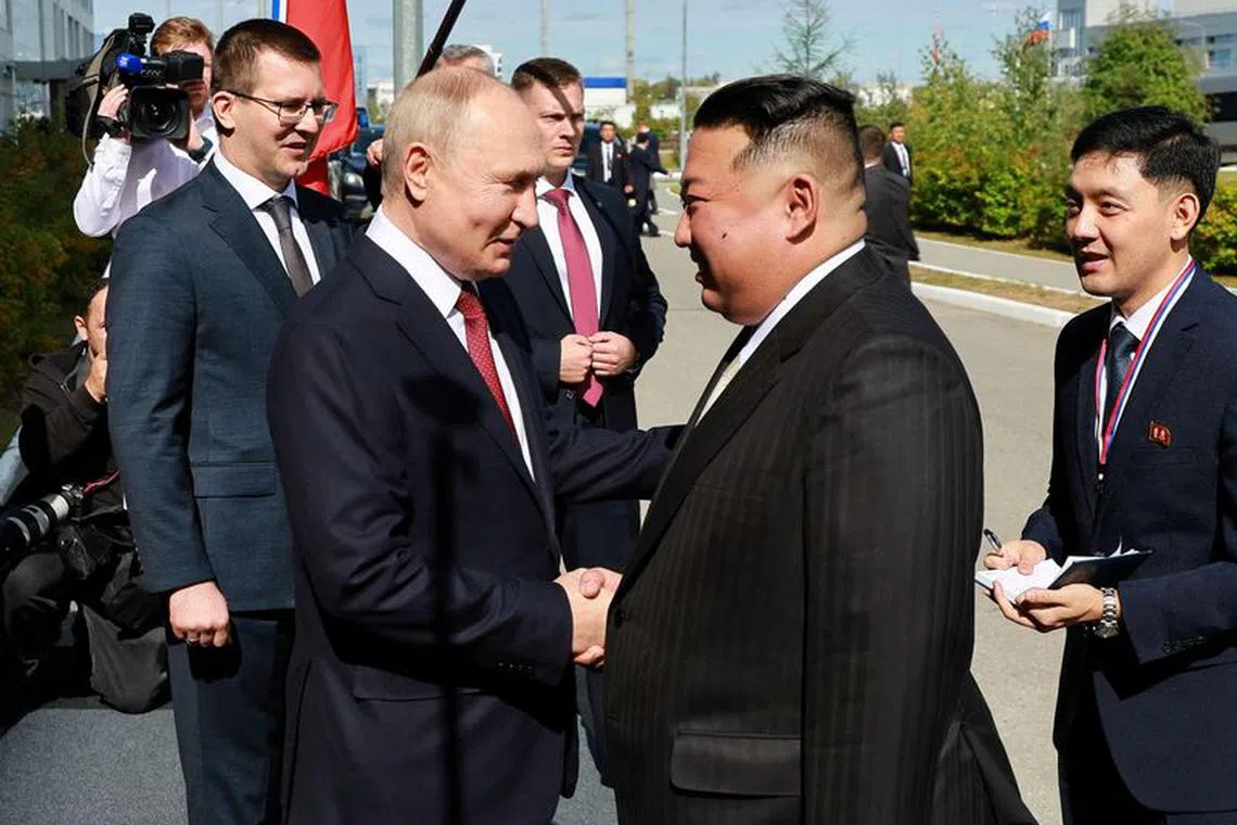Russia's President Vladimir Putin shakes hands with North Korea's leader Kim Jong Un during a meeting at the Vostochny Сosmodrome in the far eastern Amur region, Russia, September 13, 2023. Sputnik/Vladimir Smirnov/Pool via REUTERS ATTENTION EDITORS - THIS IMAGE WAS PROVIDED BY A THIRD PARTY.     TPX IMAGES OF THE DAY