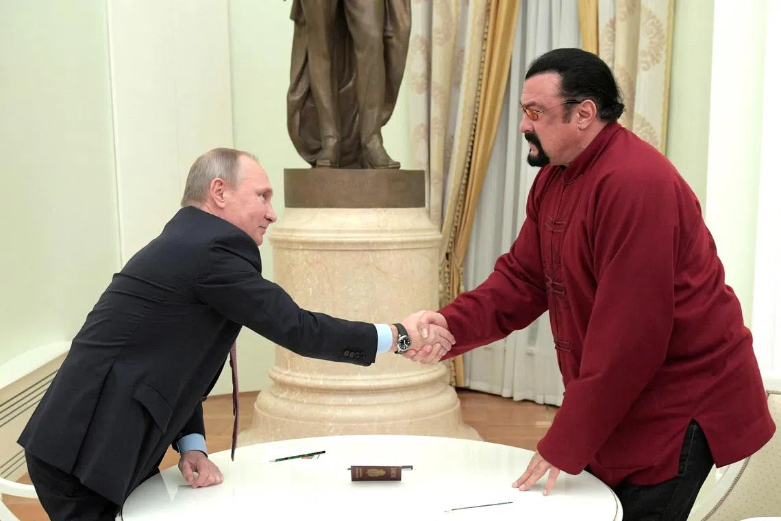 Russian President Vladimir Putin personally handed a Russian passport to actor Steven Seagal in 2016.