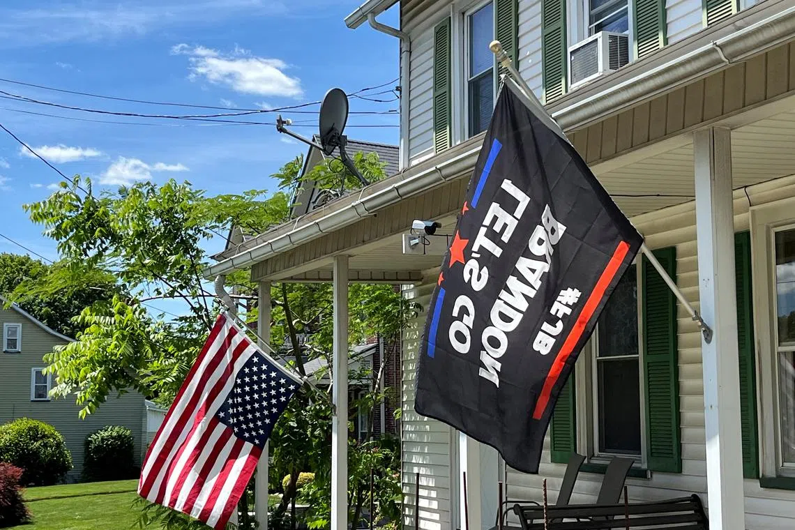A U.S. flag flies upside down outside a home in East Bangor, Pennsylvania, U.S., May 31, 2024. REUTERS/Nathan Layne