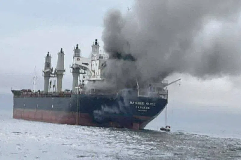 The Thailand-flagged cargo ship Mayuree Naree engulfed in black smoke in the Strait of Hormuz, March 11, 2026. ROYAL THAI NAVY/Handout via REUTERS