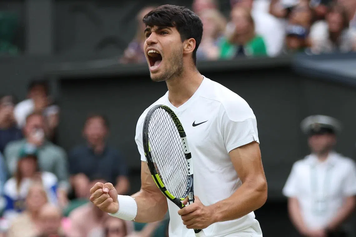 Carlos Alcaraz of Spain celebrating after winning a game during his men's singles fourth-round match against Ugo Humbert of France at the Wimbledon Championships on July 7. Alcaraz triumphed 6-3, 6-4, 1-6, 7-5.