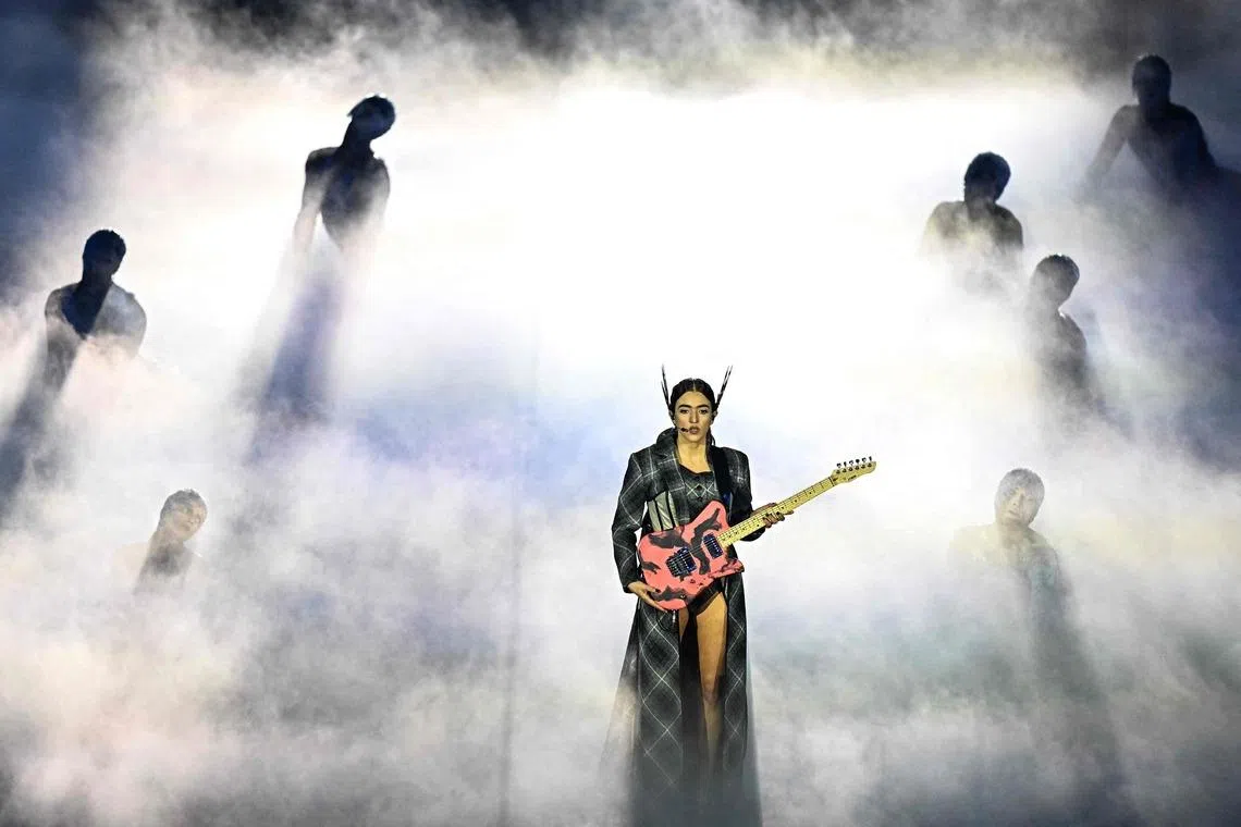 Italian singer-songwriter Joan Thiele performing during the closing ceremony of the Milano Cortina 2026 Winter Olympic Games at the Verona Arena in Verona, northern Italy on Feb 22, 2026. 