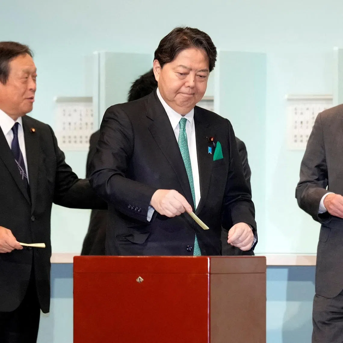 FILE PHOTO: One of candidates Yoshimasa Hayashi casts his ballot at the Liberal Democratic Party's (LDP) leadership election Friday, Sept. 27, 2024, in Tokyo. Hiro Komae/Pool via REUTERS/File Photo