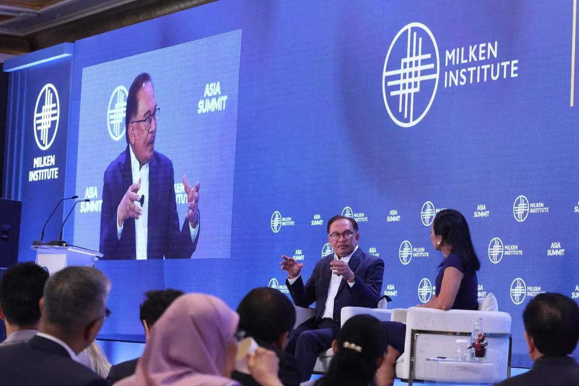 CMG20230913-NeohKL01 梁麒麟/范晓琪/ 10th Milken Institute Asia Summit: Global Investment Outlook [Four Season Hotel]

(A Conversation with Prime Minister of Malaysia, The Honourable Dato' Seri Anwar Bin Ibrahim. Right: Moderator Haslinda Amin Anchor and Chief International Correspondent for Southeast Asia, Bloomberg and Dato' Seri Anwar Bin Ibrahim.)