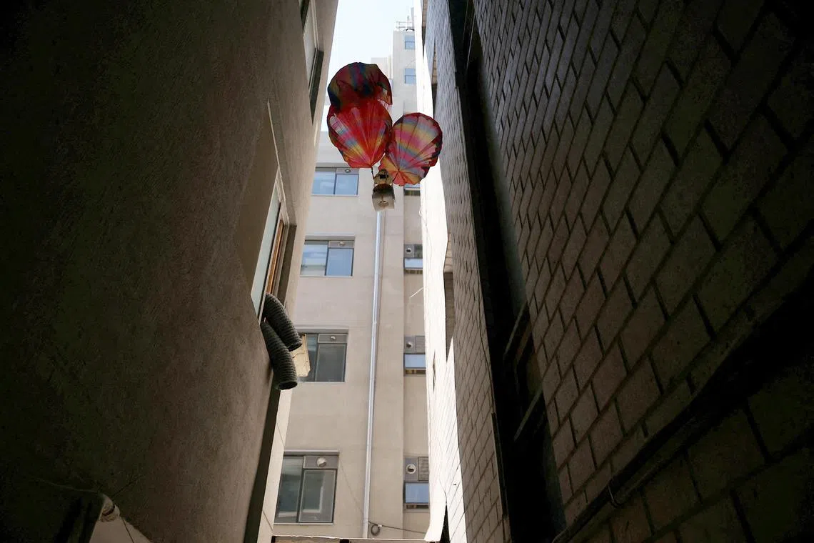 A speaker device attached to parachutes meant for broadcasting anti-North Korean messages after being carried over North Korean territory by balloon, in Seoul.