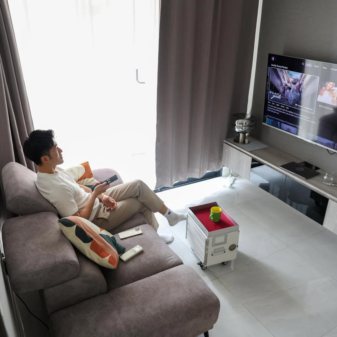 Mr Jon Phua lives in a shoebox condo unit that forms part of a trend towards smaller private residentials.