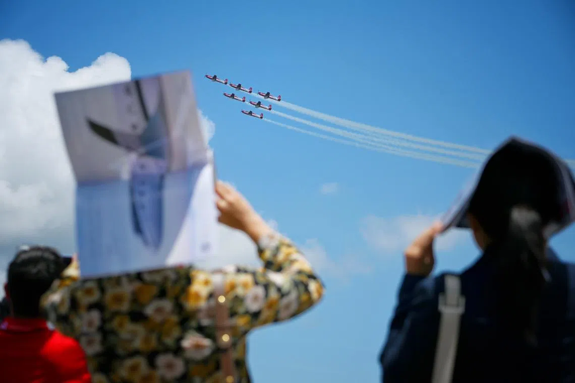 Indonesian Air Force's Jupiter Aerobatic Team performing in their KT-1Bs during an aerial display at the Singapore Airshow at the Changi Exhibition Centre on Feb 20, 2024.