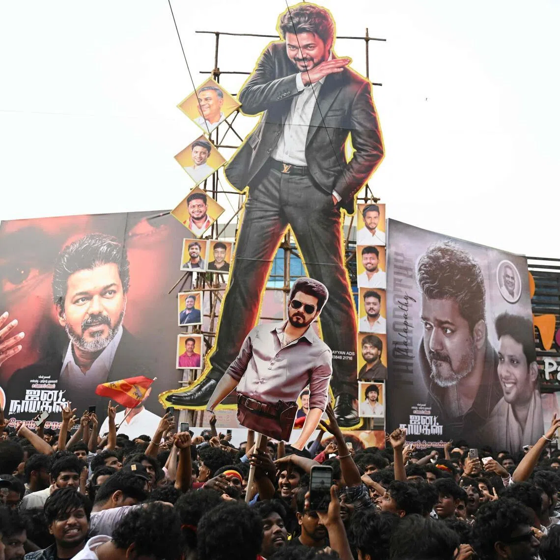 Fans celebrate during the theatrical release of film 'Jana Nayagan' starring actor and Tamil Nadu's Chief Minister C. Joseph Vijay, in Chennai on July 23, 2026. (Photo by R.Satish BABU / AFP)