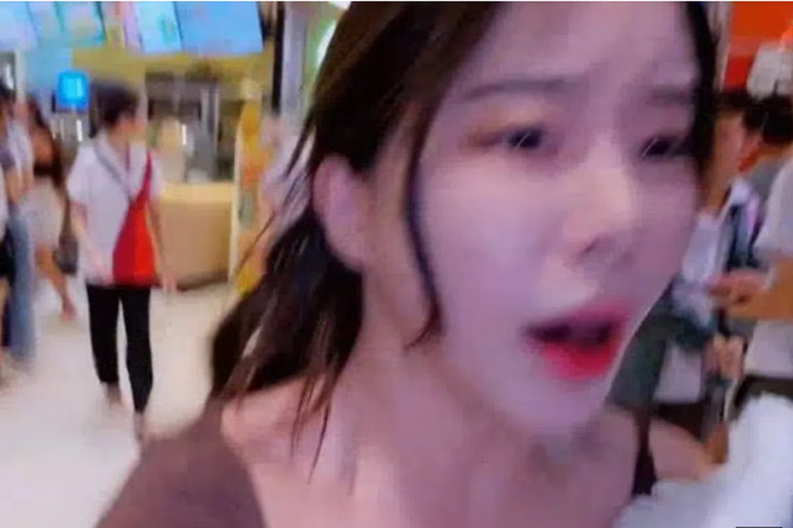 The live-streamer, known as Barbie Jini, picked up her camera and continued recording as she bolted the mall’s exit.