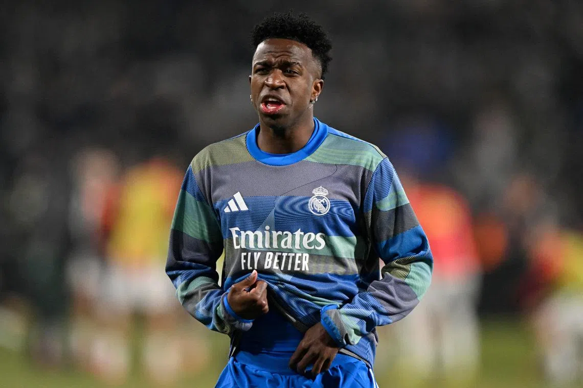Soccer Football - Copa del Rey - Round of 16 - Albacete v Real Madrid - Estadio Carlos Belmonte, Albacete, Spain - January 14, 2026 Real Madrid's Vinicius Junior during the warm up before the match REUTERS/Pablo Morano