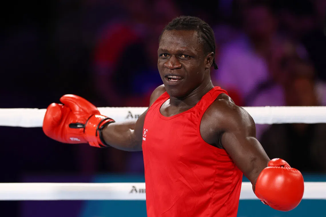 FILE PHOTO: Commonwealth Games 2026 - Boxing - SEC Centre, Glasgow, Scotland, Britain - July 29, 2026  Uganda's Aziz Abdul reacts during the men's 90+kg quarter-final 2 against England's Damar Thomas REUTERS/Matthew Childs/File Photo