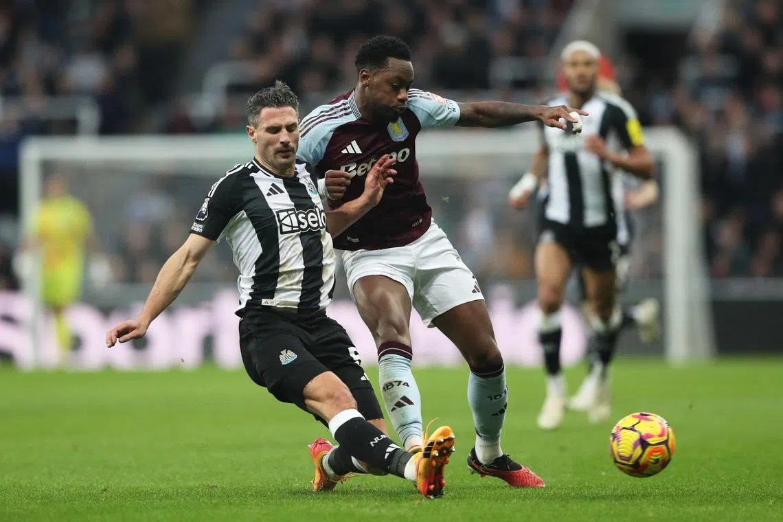 Soccer Football - Premier League - Newcastle United v Aston Villa - St James' Park, Newcastle, Britain - December 26, 2024 Aston Villa's Jhon Duran fouls Newcastle United's Fabian Schar before is shown a red card REUTERS/Scott Heppell/ File Photo
