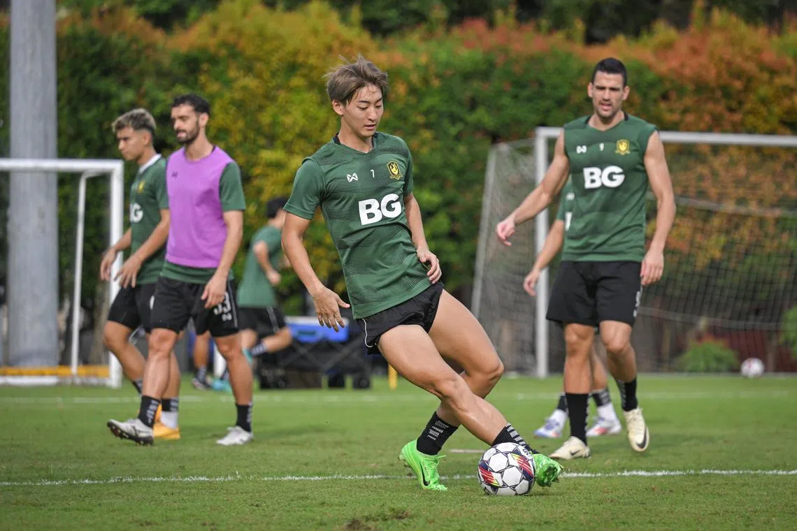 ST20240627_202457984071/tbsoc29/Shintaro Tay/Lin Tianbao/ Tampines Rovers' Seia Kunori (center) with Boris Kopitovic (right) in action during a training session at Geylang ActiveSG Field on June 27, 2024. Singapore Premier League preview: BG Tampines Rovers v Hougang United. Seia Kunori has four goals in the same number of appearances this season after joining BG Tampines Rovers from Albirex Niigata at the start of 2024.