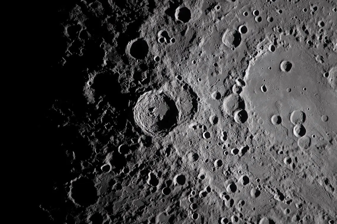 A view of the Vavilov Crater (centre), and the older and larger Hertzsprung Basin, right, on the far side of the Moon during the Artemis II flyby on April 6, 2026. 