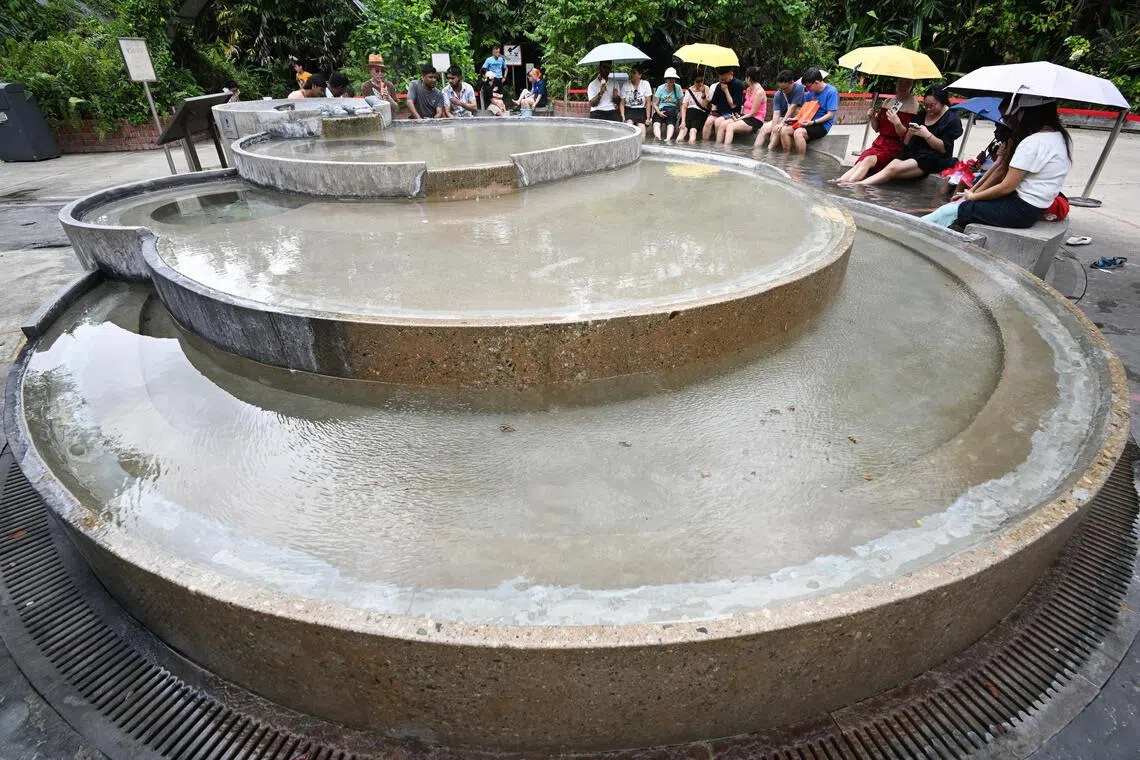 ST20260101-202632800694-Lim Yaohui-pixgeneric/

Visitors holding umbrellas under the afternoon sun and soaking their feet in the cascading foot bath pool at Sembawang Hot Spring Park on Jan 1, 2026. 

The only natural hot spring on mainland Singapore, Sembawang Hot Spring Park was opened on Jan 4, 2020. It has a cascading pool where visitors can soak their feet in the water, which is believed to have healing properties. The water from the hot spring was once bottled by F&N and sold under the Seletaris label. Underground areas with high temperatures near the hot spring are being studied as a potential geothermal energy source.

(ST PHOTO: LIM YAOHUI)