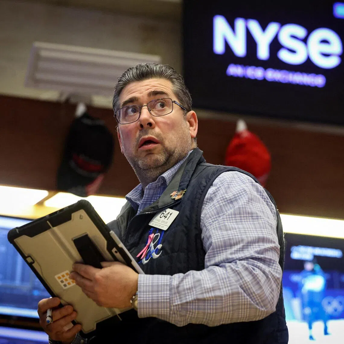 A trader working on the floor of the New York Stock Exchange, in New York City, on Feb 5.
