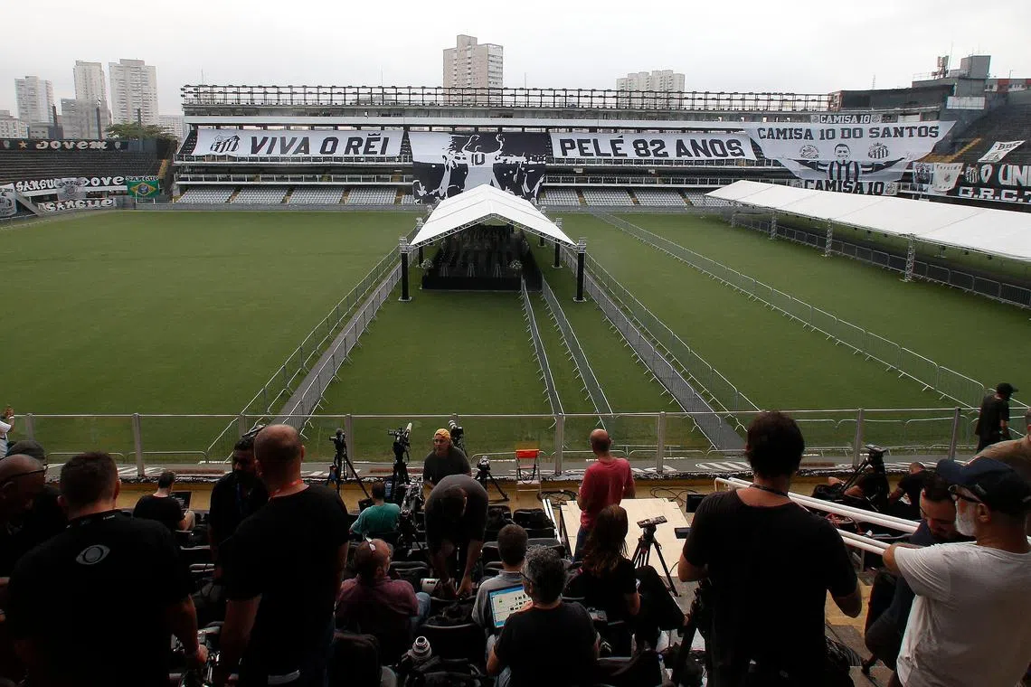 A general view shows the Vila Belmiro stadium before the start of the wake for Brazilian football legend Pele in Santos city, in Sao Paulo on Monday.  A 24-hour wake for Pele will be held at the stadium starting on Monday, following by what is expected to be a massive funeral procession through the city before his burial at Santos' Necropole Memorial Cemetery in a private ceremony on Tuesday.