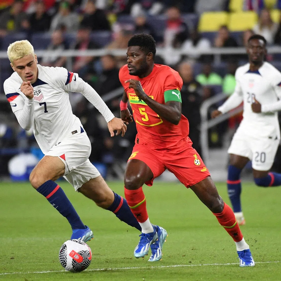 FILE PHOTO: Oct 17, 2023; Nashville, Tennessee, USA; Ghana midfielder Thomas Partey (5) handles the ball against United States midfielder Gio Reyna (7) during the first half at GEODIS Park. Mandatory Credit: Christopher Hanewinckel-USA TODAY Sports/File Photo