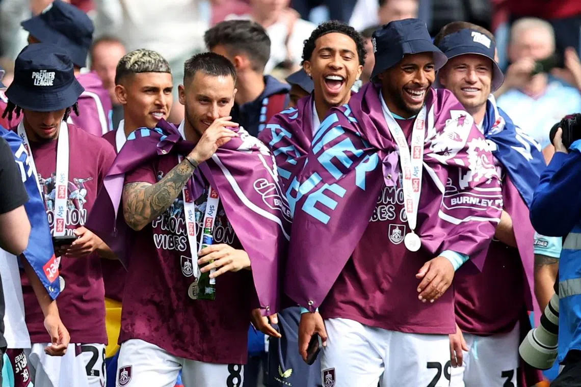 FILE PHOTO: Soccer Football - Championship - Burnley v Millwall - Turf Moor, Burnley, Britain - May 3, 2025 Burnley's Josh Brownhill celebrates with Josh Laurent after they win automatic promotion Action Images/Craig Brough/File Photo